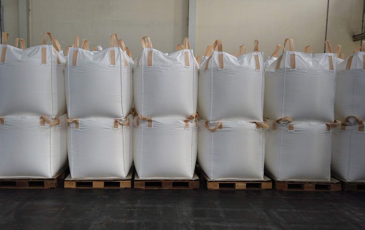 Stacking of bulk cargo in jumbo bags are store in warehouse